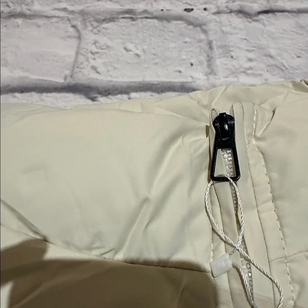 Winter Cream Cropped Puffer Jacket With a Stand up Collar. - Picture 6 of 8